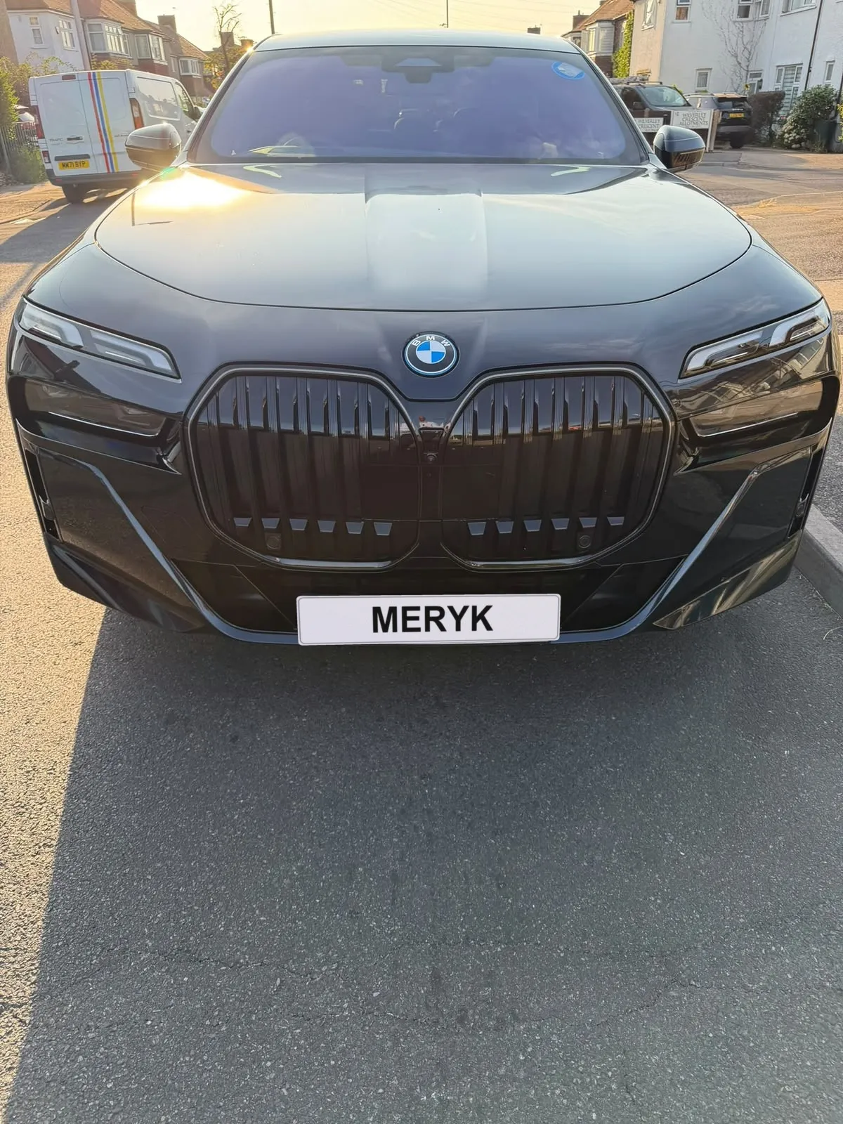 BMW i7 luxury saloon with a MERYK number plate