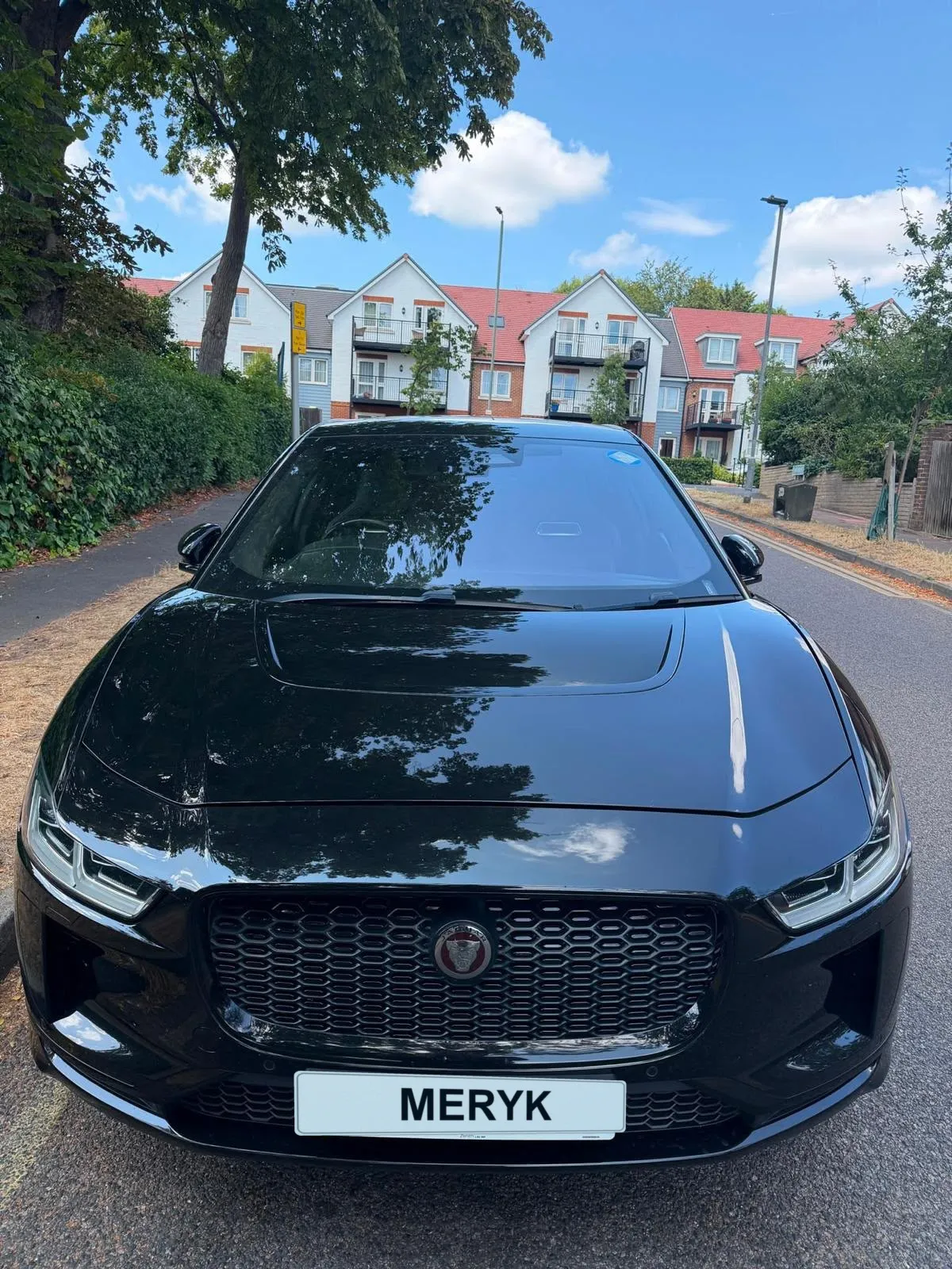 Black Jaguar I-Pace with a MERYK number plate